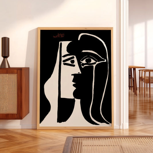 Pablo Picasso Two Faces wall art print displayed in a bright modern living room