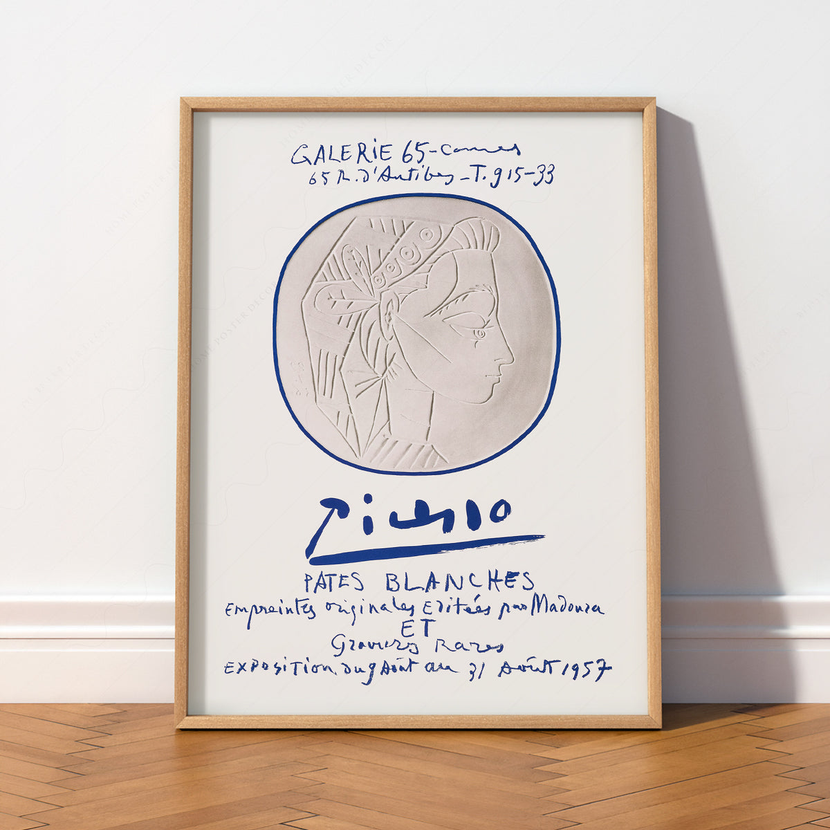 Pablo Picasso Galerie 65 Pâtes Blanches exhibition poster featuring embossed portrait relief with blue circle and signature.